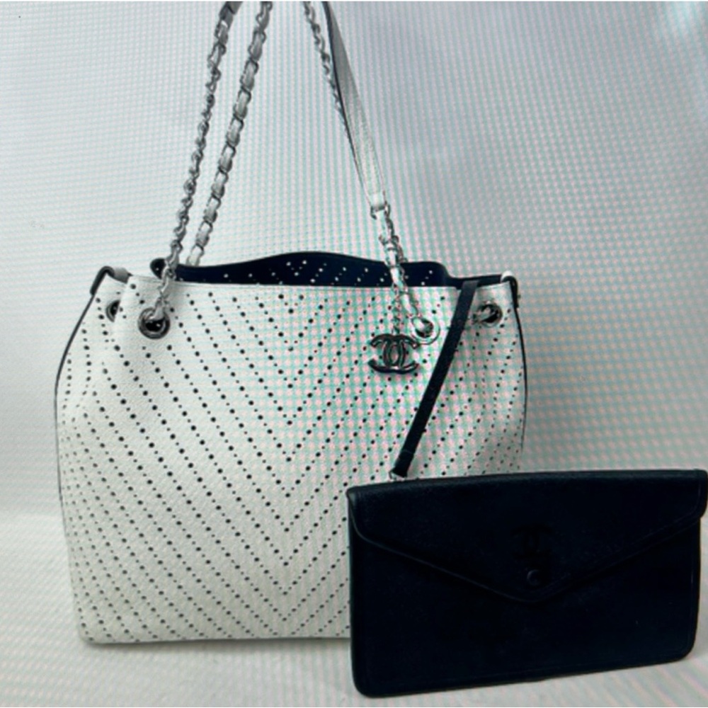 Authentic Chanel White perforated Handbag
